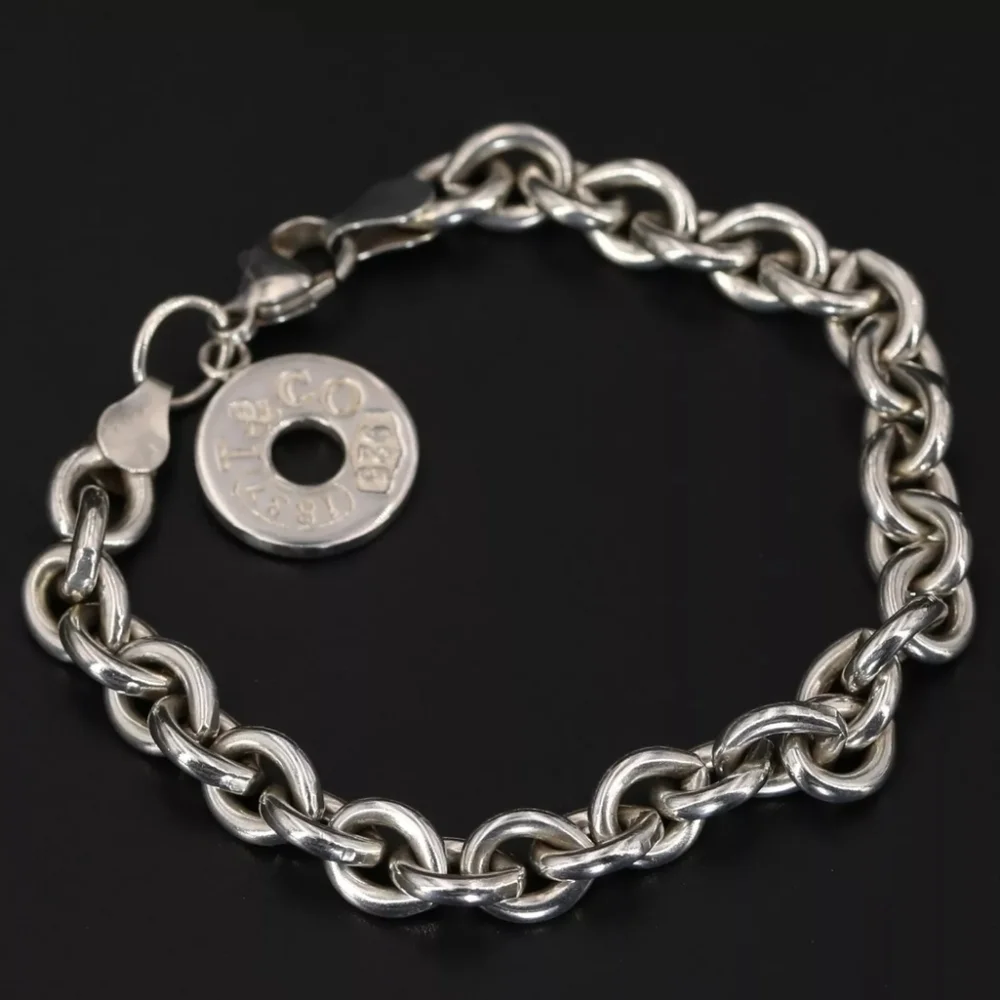 Authentic Tiffany and Co. Sterling Silver Charm Bracelet! - Picture 9 of 14